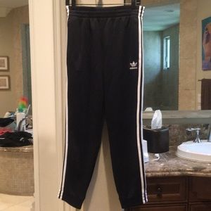 Adidas black track pants white stripes